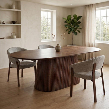 Donkerbruine ovale eettafel van mangohout